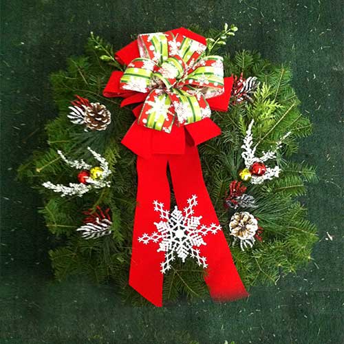 Christmas trees, poinsettias and festive holiday decor available at Tom Strain and Sons in Toledo, Ohio!